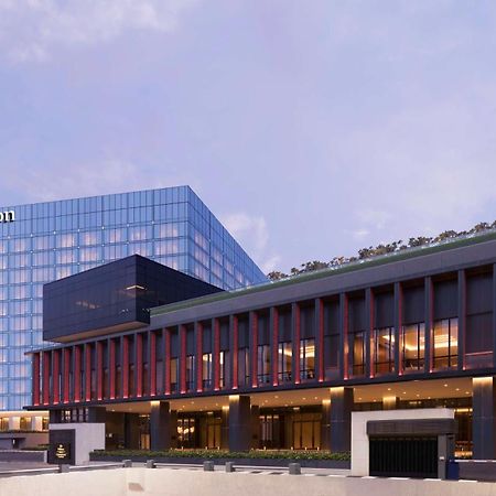 Hilton Bengaluru Embassy Manyata Business Park Hotel Bagian luar foto